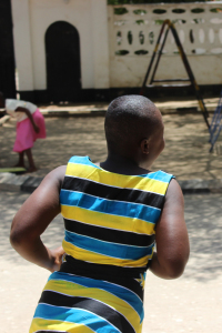 Zainabu running around the Children's Home