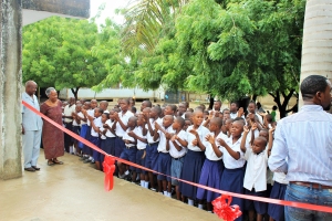 Students excitedly await the opening 