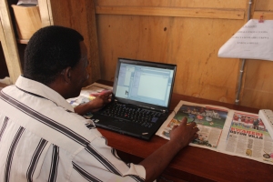 Kasuga navigating the computer on his own, practicing what he's been taught. 